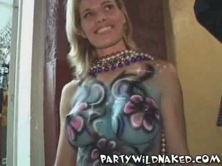 Wild Mardi Gras Girls with Body Painted Breasts